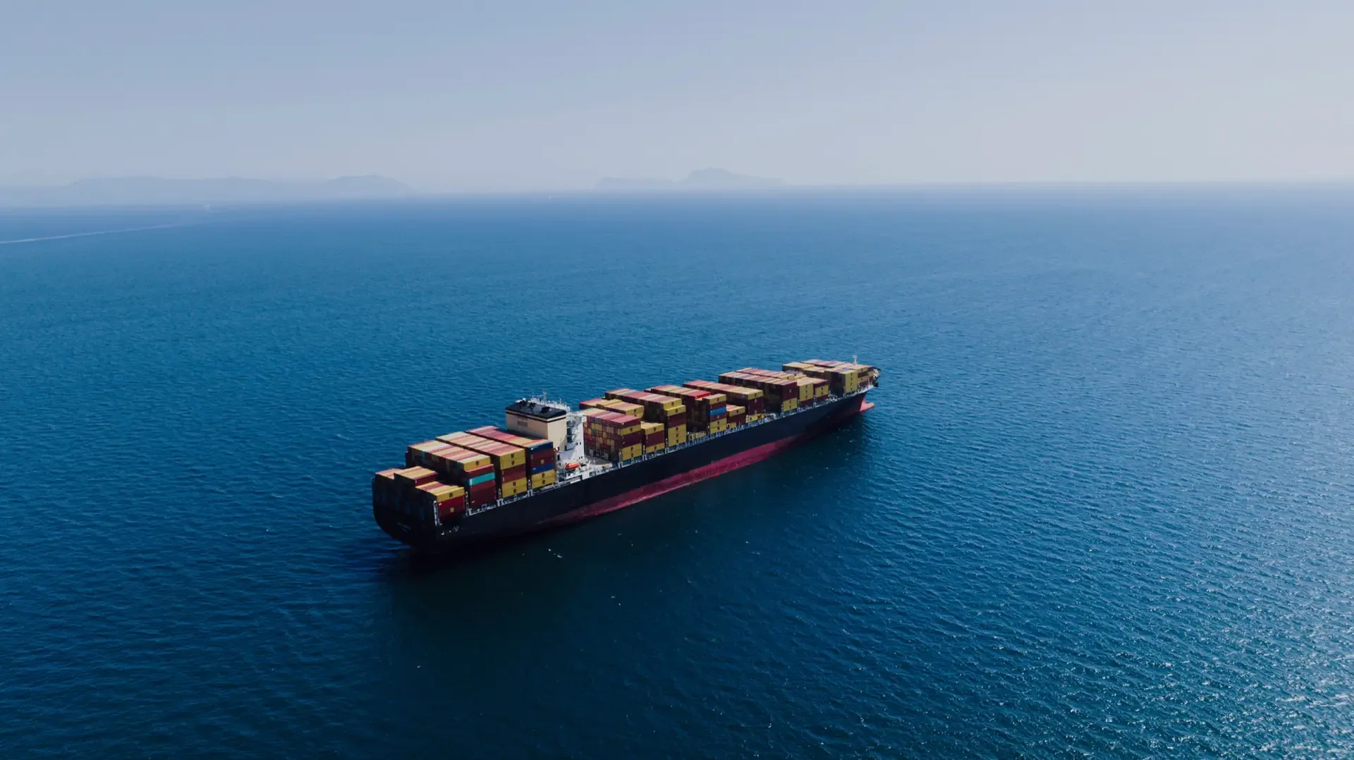 Container ship crossing open water