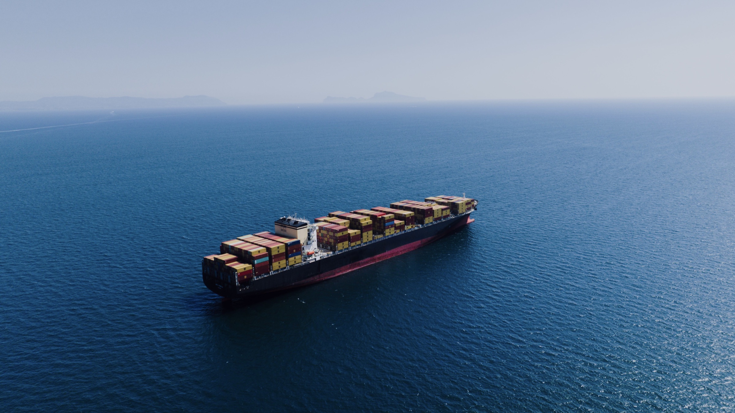 Container ship crossing open water